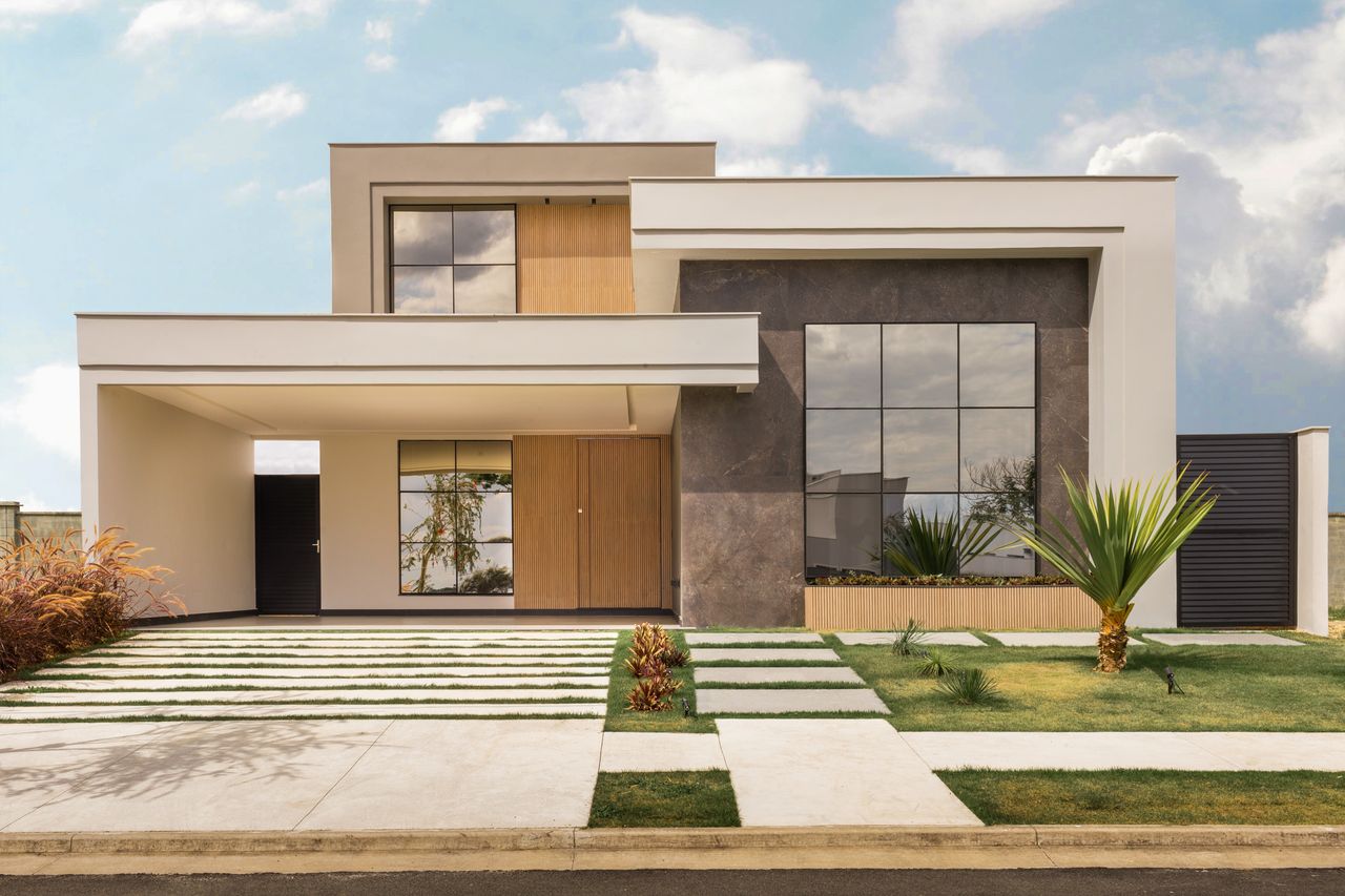 services-01 Contemporary house exterior with minimalist design, large windows, and landscaped front yard.